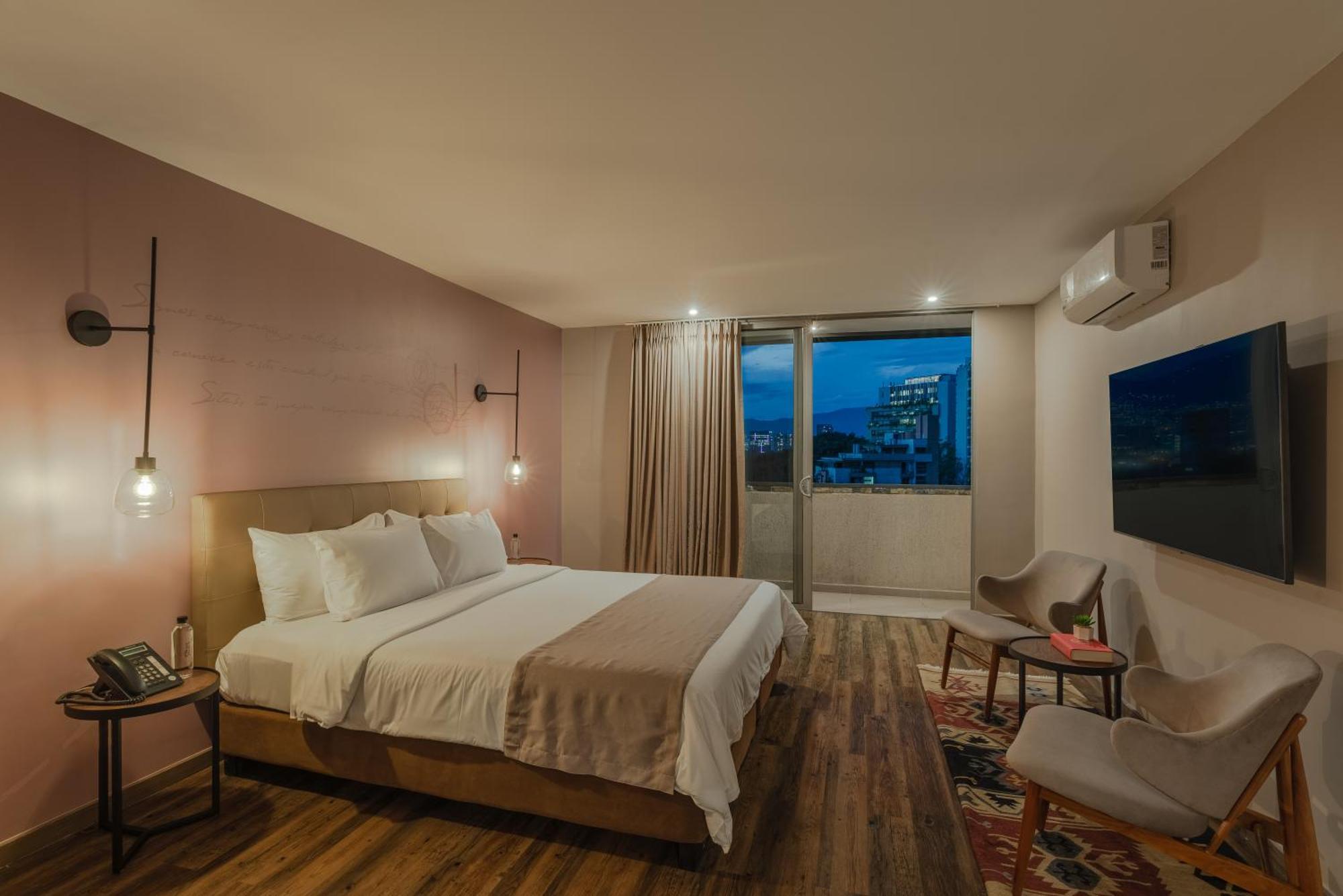 Sites Hotel Medellin Exterior photo A bedroom at the hotel