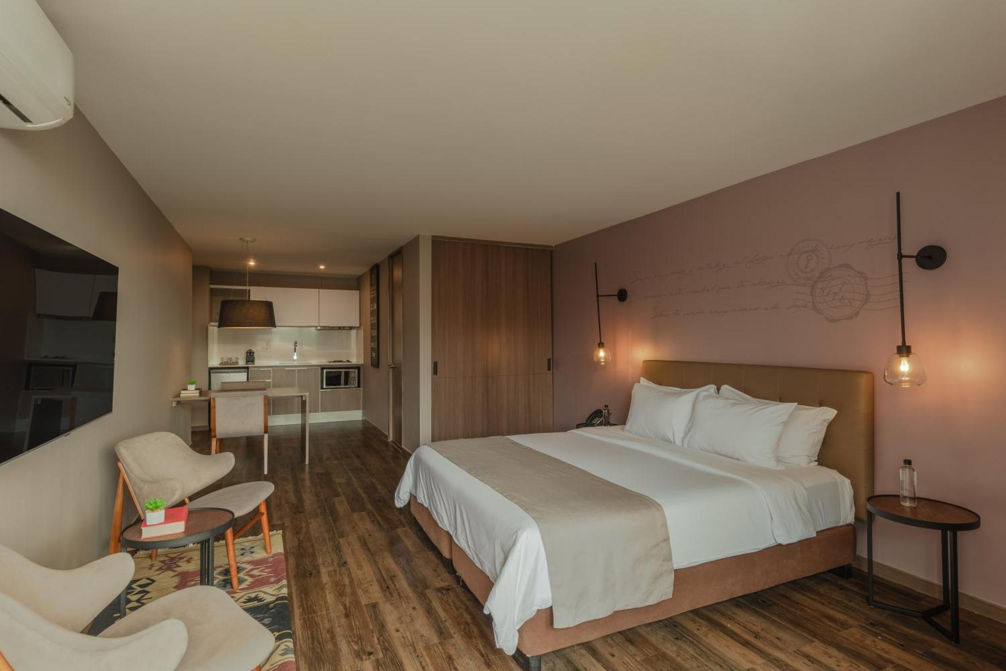 Sites Hotel Medellin Exterior photo A room at the hotel