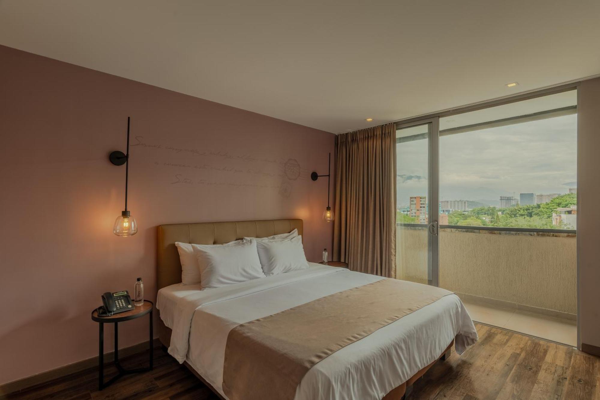 Sites Hotel Medellin Exterior photo A bedroom at the hotel