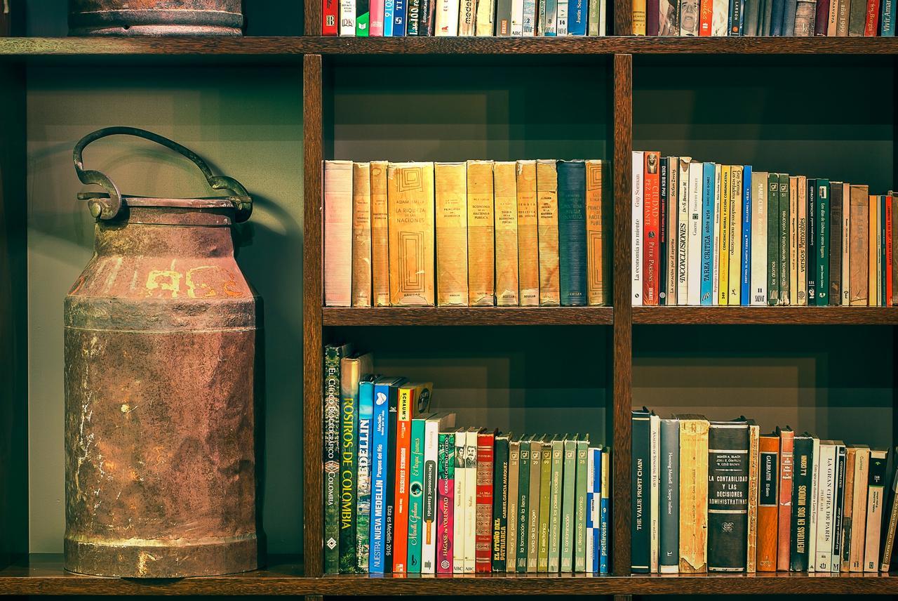 Sites Hotel Medellin Exterior photo Books on a bookshelf