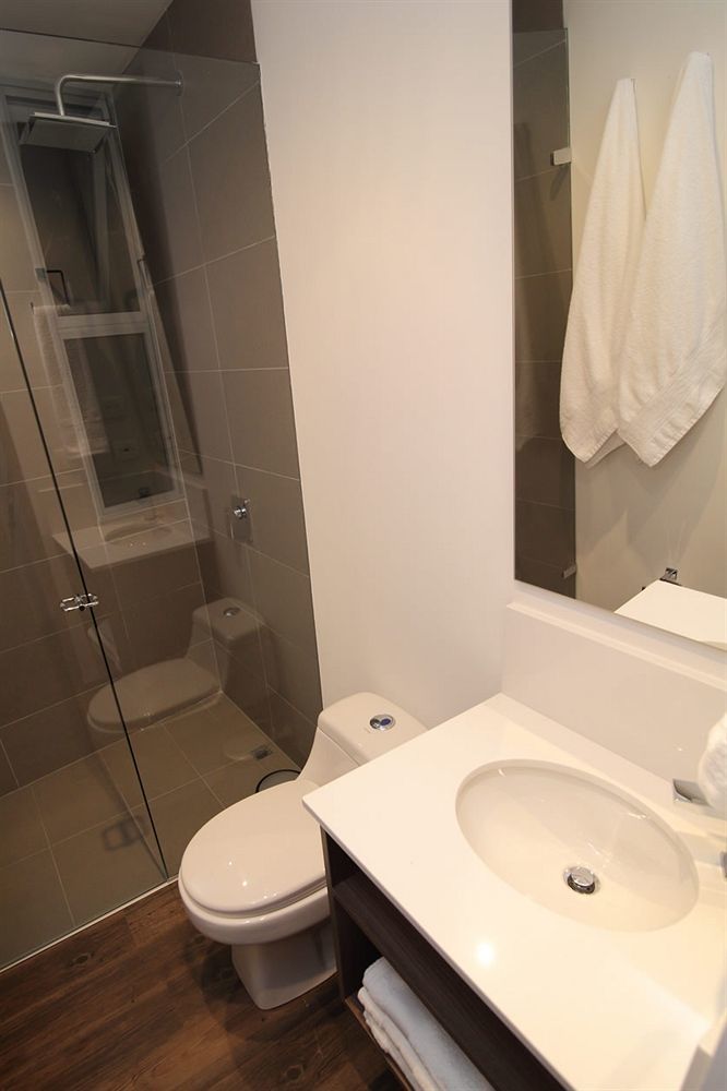 Sites Hotel Medellin Exterior photo A shower with a sliding door