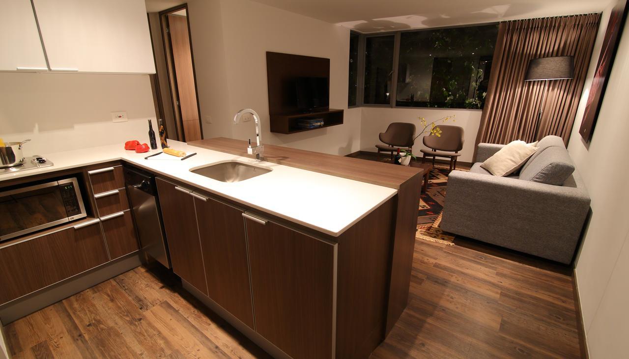 Sites Hotel Medellin Exterior photo A modern open-plan kitchen
