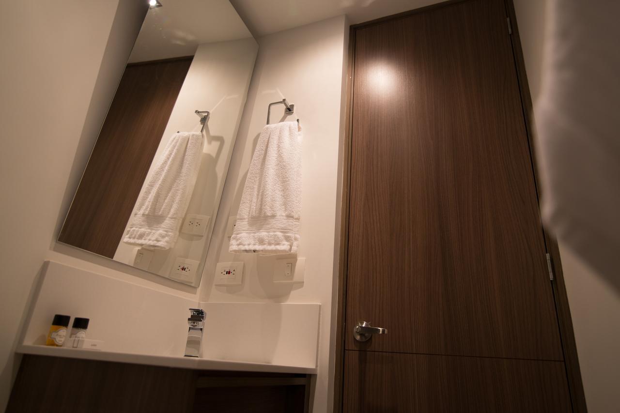 Sites Hotel Medellin Exterior photo A bathroom in a capsule hotel