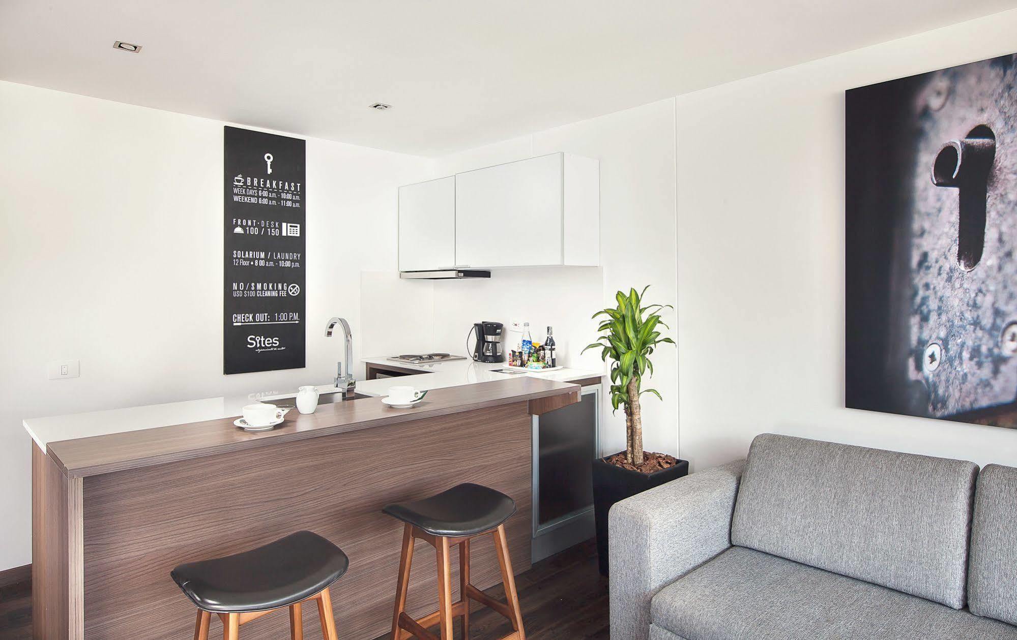 Sites Hotel Medellin Exterior photo A kitchen in a serviced apartment